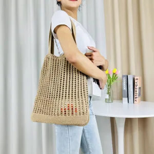 Beigefarbene Strick Häkel Tote Bag stilvolle hohle Schultertasche lässige Strandtasche für Damen