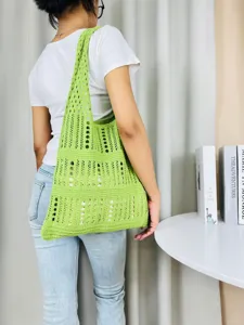 Grüne gehäkelte Schultertasche, stylische, hohle, lässige große Strandtasche für Damen.