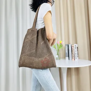 Brown knitted hollow tote bag for women, large capacity woven shoulder bag for beach and daily.
