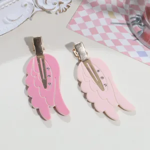 Sweet angel wing hair clips, cute pink duckbill clips for women and girls daily styling, detail view.