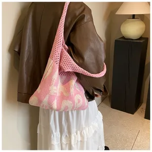 Rosa Strick-Umhängetasche für Damen, lässige Strick-Tragetasche mit stylischem Muster.