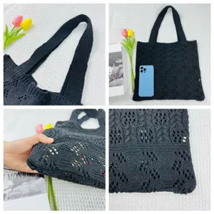 Detailansicht der schwarzen Strick-Tote-Bag mit feiner Webstruktur und stabilen Griffen.