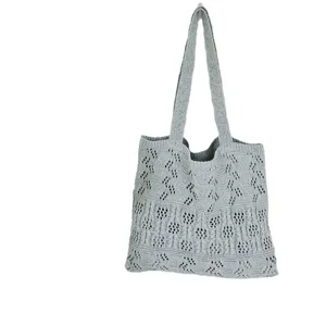 Graue Strick-Tasche, Hohl-Strandtasche, minimalistische lässige Handtasche für Damen.