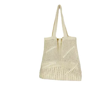 Beige knitted hollow shoulder bag, casual large capacity beach tote bag for women daily use.