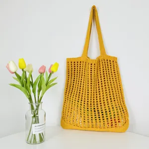 Gelbe Häkel-Strick-Tasche, stilvolle ausgehöhlte Umhängetasche für Strand und Alltag.