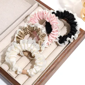 Elegant satin scrunchies with delicate lace trim, stylish hair ties for daily commuting.