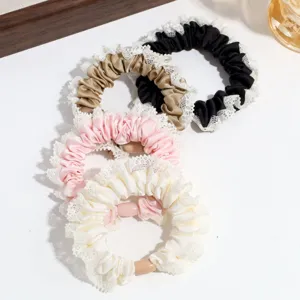 Elegant satin hair scrunchies set with delicate lace trim, chic daily hair accessories.