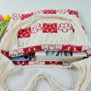 Knitted tote bag for women, large capacity woven shoulder bag with cute red floral pattern.