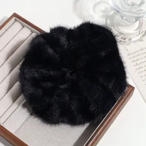 Oversized black faux rabbit fur hair scrunchie, soft fluffy plush ponytail holder for women.