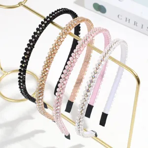 Crystal rhinestone headband set, elegant shiny hair hoops detail display on gold rack.