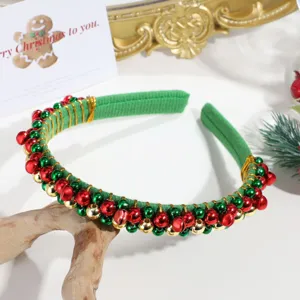 Christmas bell headband detail shot, featuring red green and gold beads, festive hair accessory.