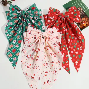 Pince à Cheveux Nœud en Tissu Imprimé Père Noël Bonhomme de Neige Élan Douce Grande Pince à Ressort Ruban Coiffe Festive pour Fête des Femmes