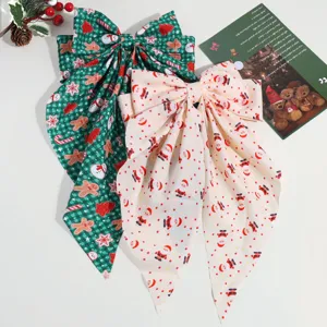 Pince à cheveux nœud de Noël avec imprimé Père Noël et bonhomme de pain d'épice, joli style.