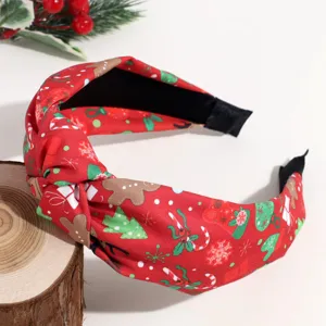 Christmas fabric knotted headband detail view, red festive print hair hoop accessory.