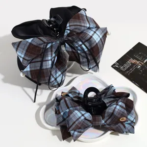 Blue brown plaid hair claw clip with black satin bow and pearl detail for women styling
