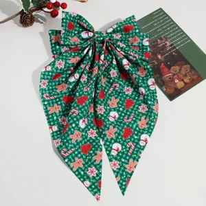 Pince a cheveux noeud carreaux verts de Noel avec imprime bonhomme de neige et pain d epices.