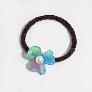 Iridescent acetate four leaf clover hair tie with faux pearl center, cute ponytail holder.