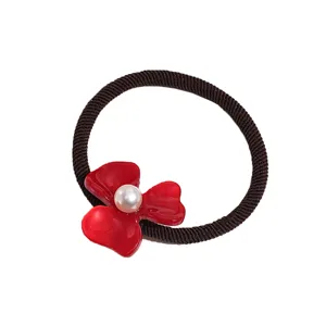 Chic forest style brown hair tie with red acetate flower and faux pearl accent for women.