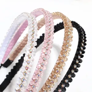Detailed view of sparkly crystal rhinestone headbands in multiple chic colors for women hair styling.