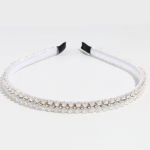Elegant white crystal rhinestone headband detailed view sparkling hair accessory for women.