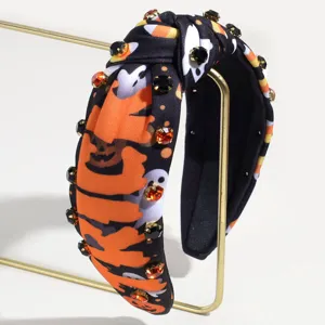 Close-up detail of Halloween themed rhinestone padded headband with spooky ghost pattern