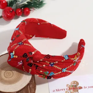 Rode fluwelen haarband met pailletten en knoop voor kerstfeest, feestelijk haaraccessoire.