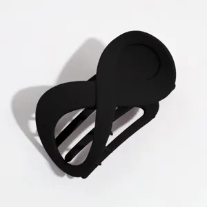 Pinza de pelo negra mate en forma de ocho para peinados elegantes y prácticos diarios.