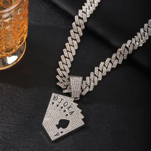 Detail shot of a hip-hop rhinestone Cuban chain necklace featuring a poker card pendant.