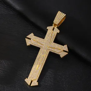 Detailed close-up view of the golden rhinestone cross pendant showcasing fine craftsmanship.