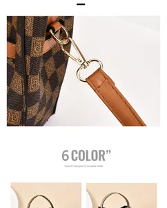 Détail de sac seau à carreaux classique avec quincaillerie métallique et lanière pour femmes.
