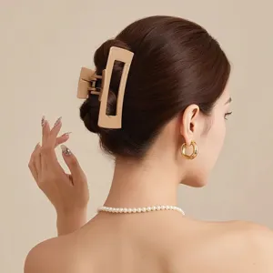 Beige hollow rectangle hair claw detail, elegant shark clip for stylish hairstyles.
