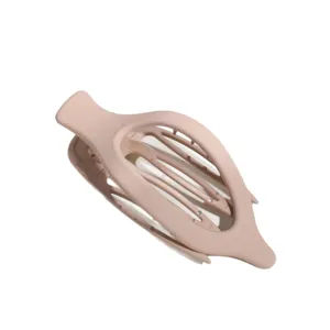 Molla per capelli ovale opaca in tinta unita da donna, elegante accessorio quotidiano.