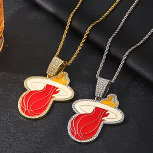 Detailed view of fashionable Miami Heat basketball pendant necklaces with full rhinestones and Cuban chains.