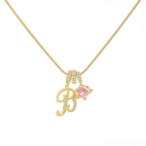 Gold letter B necklace with pink heart saturn pendant, elegant zircon choker jewelry.