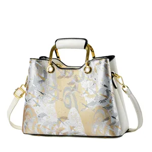 Elegante Damen Handtasche im chinesischen Stil mit Kranich und Wolken Muster Luxus Umhängetasche