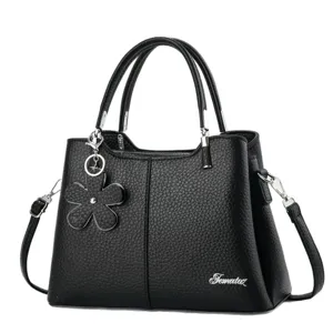 Borsa a mano nera in pelle da donna borsa a tracolla con ciondolo a fiore elegante chic