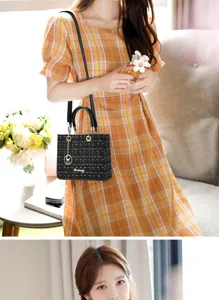 Elegant tweed top handle crossbody bag for women, chic textured shoulder bag detailed view.