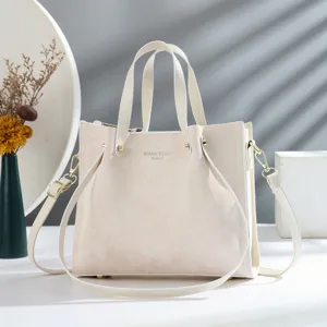 Elegante borsa tote retrò in pelle PU con manici e tracolla per uso quotidiano femminile.