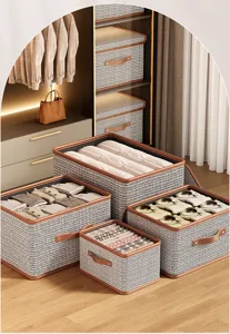 Kleding opbergdoos van tweed stof met deksel en lederen handvat voor de garderobekast.
