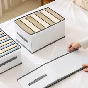 Collapsible clothes organizer box with dividers, foldable wardrobe storage container for pants.