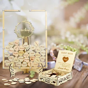 Wooden wedding guest book drop top frame with acrylic front, heart-shaped tokens and storage box.