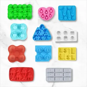 Set of colorful silicone ice cube molds in various cute shapes, flexible and durable kitchen bakeware.