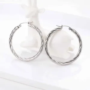High quality stainless steel twisted hoop earrings for women, stylish silver metal round earrings.