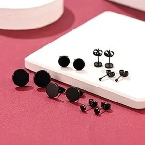 Stainless steel black round stud earrings detail, minimalist metal design for women jewelry.