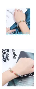 Bracelet jonc torsadé en acier inoxydable avec pierres colorées pour femme bijou mode.