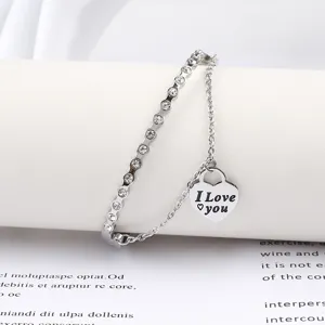 Stainless steel rhinestone heart pendant double chain bracelet detail view for women.