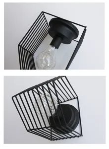 Smeedijzeren huisvormige decoratieve tafellamp detail, minimalistisch nachtlampje slaapkamer.