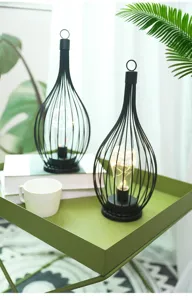 Europäische minimalistische Eisen geometrische hohle LED Laterne Retro Glühbirne Heimdekoration