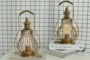 Vintage LED iron table lamp, decorative metal wire lantern night light for home decor desk.