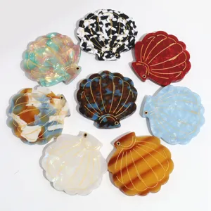 Compact shell folding makeup mirror set with chic marbled design and elegant gold line details.
